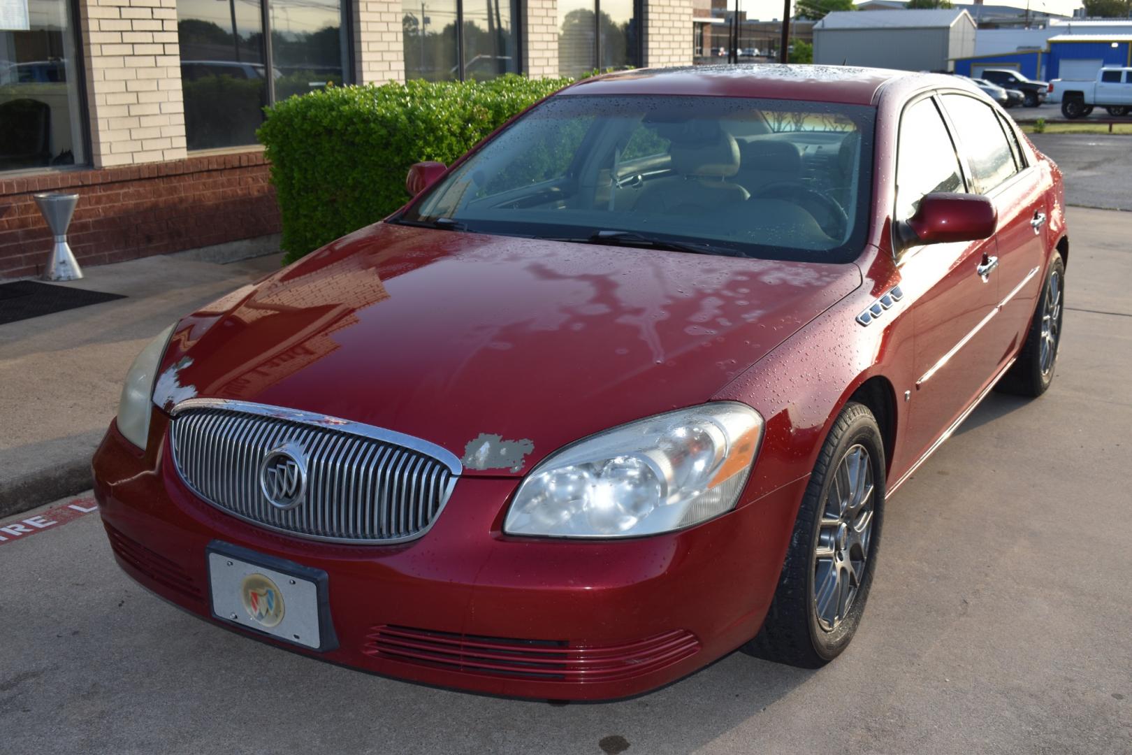 2007 Red /Tan Buick Lucerne CXL V8 (1G4HR57Y07U) with an 4.6L V8 DOHC 32V engine, 4-Speed Automatic Overdrive transmission, located at 5925 E. BELKNAP ST., HALTOM CITY, TX, 76117, (817) 834-4222, 32.803799, -97.259003 - Buying a 2007 Buick Lucerne can offer several benefits, depending on your needs and preferences. Here are some potential advantages: Comfortable Ride: Buick is known for prioritizing comfort, and the Lucerne is no exception. It typically offers a smooth and comfortable ride, making it ideal for lon - Photo#1